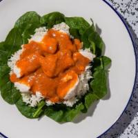 C5 Swimming Angel · Sauteed choice of meat on a bed of cooked spinach and carrots, topped with peanut sauce.