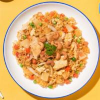 D4 Pineapple Fried Rice* · Jasmine rice stir-fried with pineapple, egg, curry powder, onions, peas-carrots, tomatoes an...