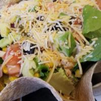 Taco Fiesta · Mixed greens, chicken or shaved steak, jack and cheddar, tomato, red onion, fire-roasted cor...