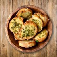 Garlic Bread With Cheese · Italian bread topped with cheese to make a delightful offering.
