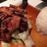 Teriyaki Chicken · Grilled chicken thigh in teriyaki sauce served with steamed vegetables.