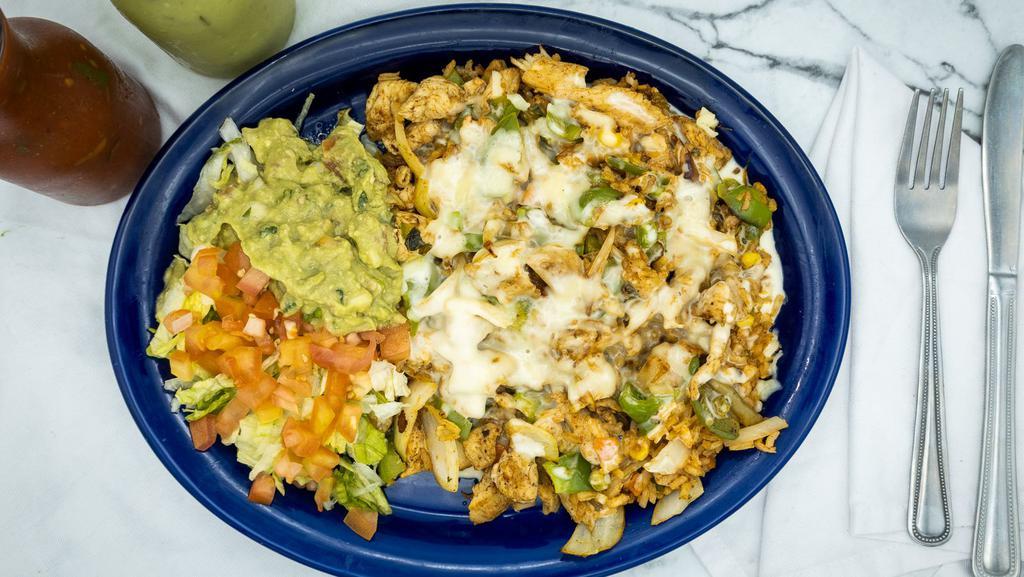 Arroz Con Pollo · Chucks of grilled chicken with bell peppers, onions, mixed with Mexican rice. Served with guacamole salad.