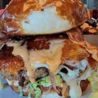 Dani'S Molten Lava Burger · 1/2 habanero burger patty| lettuce | cheese curds| fried jalapeno |caramelized onion| bacon ...