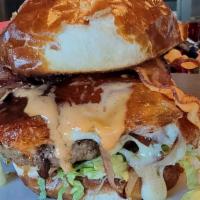 Dani'S Molten Lava Burger · 1/2 habanero burger patty| lettuce | cheese curds| fried jalapeno |caramelized onion| bacon ...