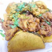 Fresh Vegetable Pakoras · Vegan. Gluten-free. Spinach, onions and potatoes fritters dipped in chickpea flour batter an...