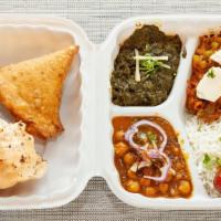 Saran Thali · Three special curries, samosa, and tikki as appetizer, lentil soup, salad, raita, white rice...