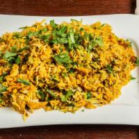 Murgh Biryani · Boneless chicken cooked with saffron basmati rice, marinated with herbs, spices, and nuts.