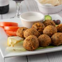 Falafel · A very popular vegetarian patty of ground garbanzo beans (chickpeas), parsley, garlic, and o...