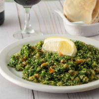 Tabouleh (Lebanese Salad) · Healthy, famous Lebanese salad of chopped parsley, diced tomatoes, onions, mint, and cracked...