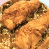 Connies Crunchberry Waffle With Chicken Breast Tenders · Two chicken breast tenders and a Crunchberry Belgian waffle with maple syrup and powdered su...
