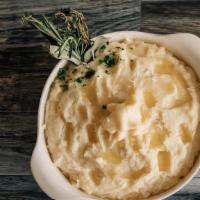 Creamy Mashed Potatoes · Rich buttery mashed potatoes and gravy.