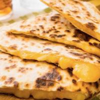 Cheesy Quesadilla · Grilled flour tortilla (large) served with cheese, sour cream and pico de gallo. Please choo...