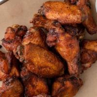 Smoked Chicken Wings - Double · 16 wings - Slow-smoked, then flash fried. Dry-rubbed or tossed in your choice of sauce. Serv...