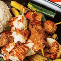 Combo Kabob (Gf) · Can't decide? Get the best of both worlds with two skewers each of chicken and lamb kabob.