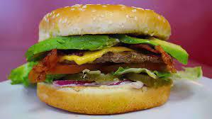 Primo'S Burger Clásica / Primo'S Classic Burger · Carne de res, lechuga,tomate, maiz, papas, mayonesa, ketchup, salsa Primo's, jamón, queso y ...