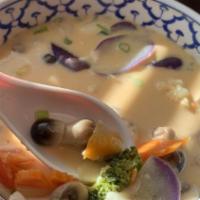 Tom Kha · Vegan. Hot and sour coconut milk soup with lemongrass, galangal roots, kaffir leaves, mushro...