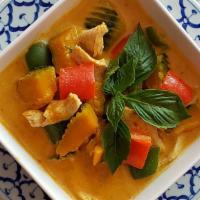 Pumpkin Curry · Mild spicy. Vegan. Gluten free.  Choice of meat in red curry paste and coconut milk with pum...