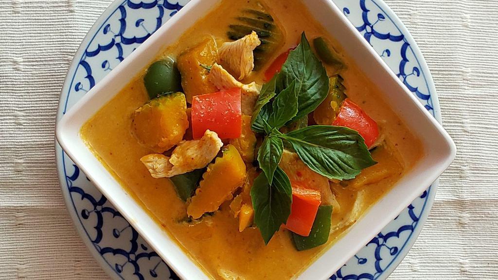 Pumpkin Curry · Mild spicy. Vegan. Gluten free.  Choice of meat in red curry paste and coconut milk with pumpkin,  bell peppers,  and sweet basils. (entrees do not included rice)