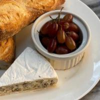 Cheese Plate Provencal · House baked French baguette served with fresh grapes and brie cheese stuffed with apples, ga...