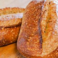 Levain · Country Levain Batard, a sourdough wheat bread made with Organic whole wheat flour and natur...