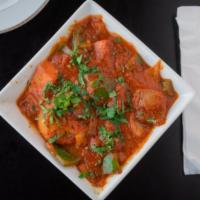 Chicken Tikka Masala · Chicken marinated in spices and yogurt, baked in a tandoor oven and cooked in a tomato based...