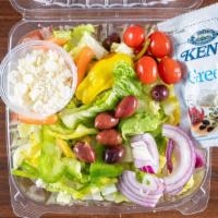 Greek · Garden salad topped with olives, feta cheese and Greek dressing.
