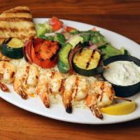 Shrimp Kabob · Served with rice, grilled vegetables, salad, pita bread and tzatziki sauce. Choice of regula...