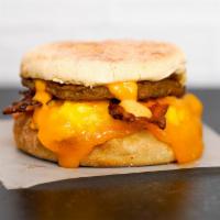 English Muffin, Bacon, Sausage, Egg, & Cheddar Sandwich · 2 scrambled eggs, melted Cheddar cheese, smoked bacon, breakfast sausage, and Sriracha aioli...