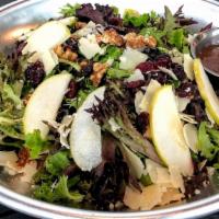 Apple Walnut · Mixed greens, apples, candied walnuts, dried cranberries, shaved parm, blush-vinaigrette.