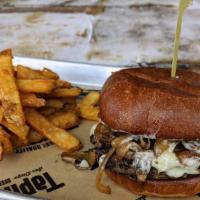 Mushroom Swiss · Brisket short rib patty, sautéed mushrooms, swiss, sautéed onions, garlic aioli, on brioche.