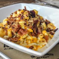 Beer Mac & Cheese · House IPA beer cheese, bacon, garlic, onions, bread crumbs.