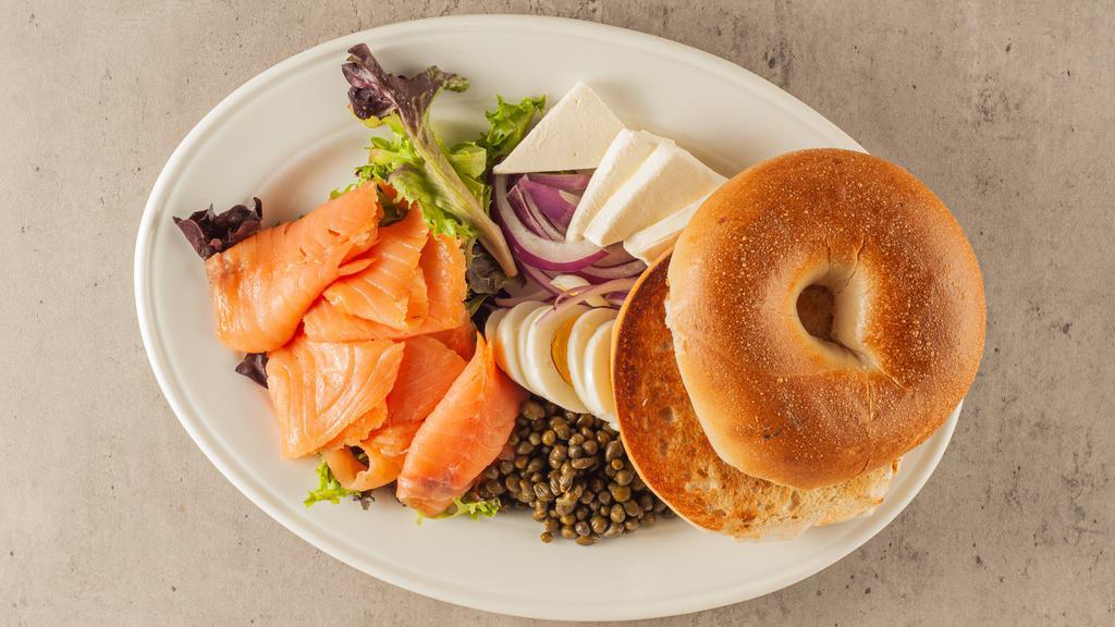 Smoked Salmon Bagel · Smoked salmon bagel ,cream cheese, chopped egg and red onion.