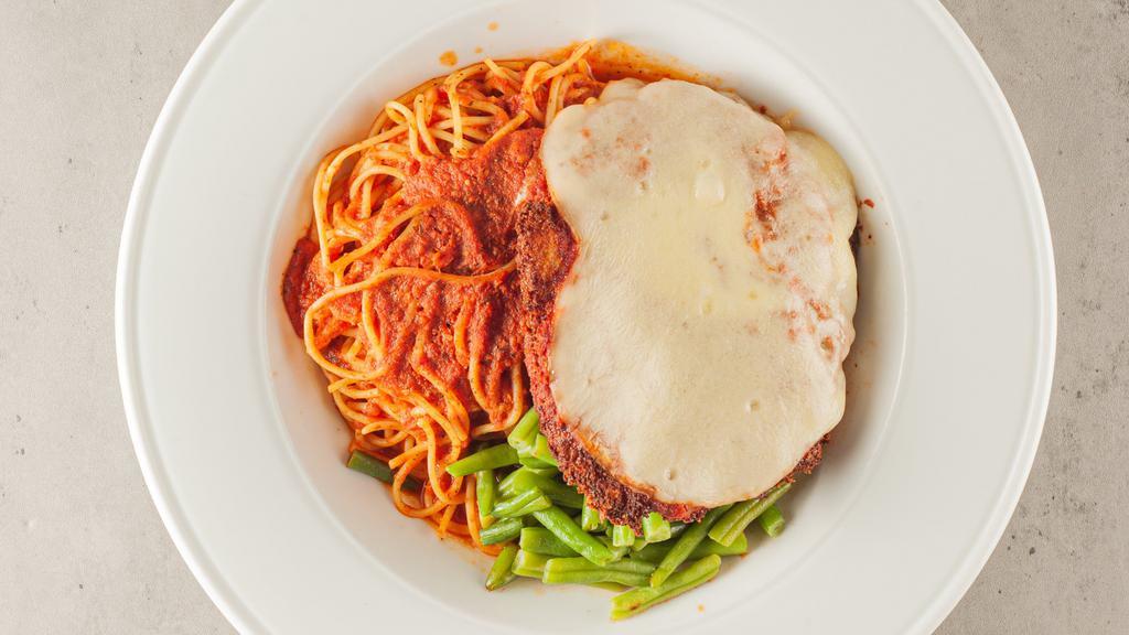 Chicken Parmesan · Served atop spaghetti and marinara with vegetable of the day.