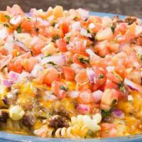 Fiesta Pasta · Choice of Queso, fundido cream cheese, red gravy, or seafood gravy. Topped with pico de gall...