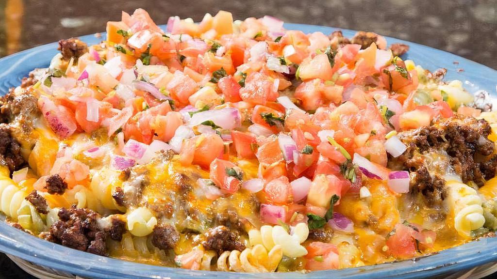 Fiesta Pasta · Choice of Queso, fundido cream cheese, red gravy, or seafood gravy. Topped with pico de gallo and cheese.