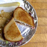 Turkey Day Sandwich · Turkey , stuffing, cranberry sauce, lettuce, mayo on grilled rye.