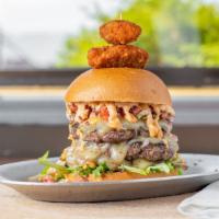 Fiery Smokehouse Burger · Two burger patties, pepper jack cheese, greens, pico de gallo, pickled jalapeños, jalapeño p...