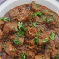 Lamb Curry Combo · Daily special serve with: Basmati Rice, Tandoori Bread and Chana Masala.