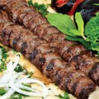 Seekh Kebab · Kabob Special serve with: Basmati Rice, Chana Masala & Tandoori Bread,

Halal. Two pieces. G...