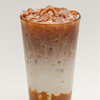 Iced Caramel Macchiato · Steamed milk, vanilla syrup, espresso and a caramel drizzle.
