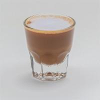 Iced Cortado · Equal parts espresso and milk.