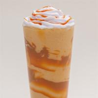 Caramel Swirl Milkshake · A caramel flavored milkshake topped with whipped cream and a caramel sauce drizzle.