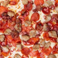  Meat Lovers · Pizza with Italian sausage, pepperoni, bacon, ham, our three-cheese blend and red sauce.
