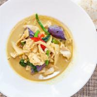 Noodle In Green Curry · Thin rice noodle, string bean, bamboo shoots, bell peppers and basil leaves in coconut green...