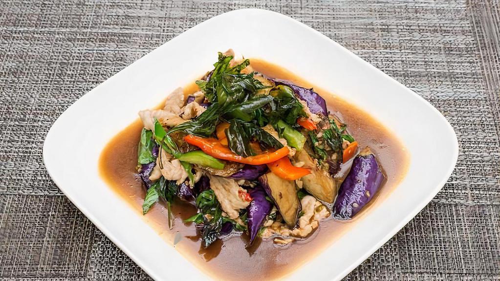 Basil Eggplant · Eggplant, bell peppers, basil and fresh chili sauteed in a garlic soybean sauce. Medium spicy.