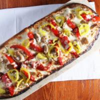 Sausage & Pepper Flatbread · Sweet Italian sausage, roasted red peppers, cherry peppers, smoked Mozzarella, and herb Rico...