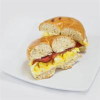 Scrambled Eggs Bagel · Toasted bagel, cream cheese, scrambled eggs & bacon.