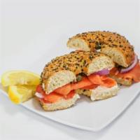 Lox & Bagel · Toasted bagel, cream cheese, smoked salmon, onions, tomatoes & capers.