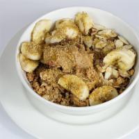 Nutty Acai · granola, banana, peanut butter, sliced almond, flax seeds, and honey