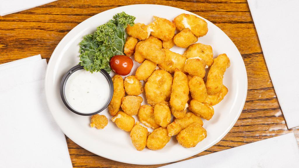 Jalapeno Cheese Curds · Wisconsin's finest cheese, jalapeños lightly hand battered and deep fried to perfection. Served with ranch